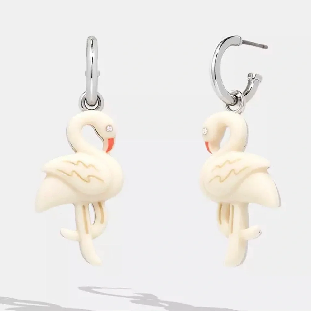 Coach Silver & White crystal studded Flamingo Huggie Earrings‎ new